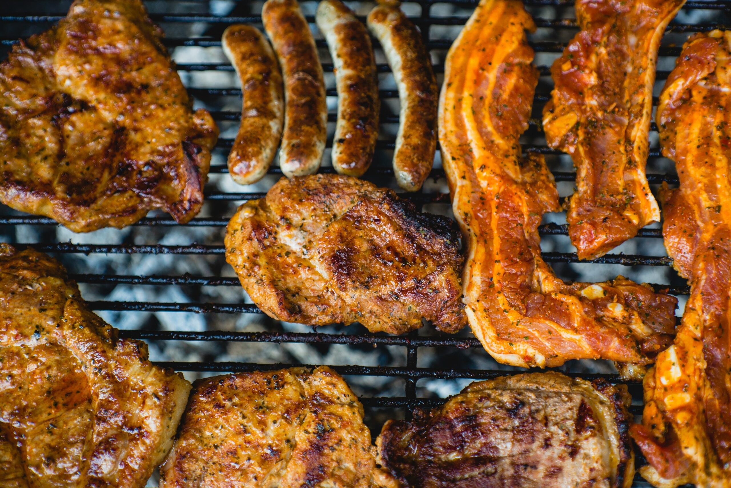 top view photo of grilling chicken and bacon